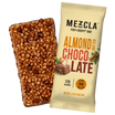 Mezcla Almond Butter Chocolate puff-crispy protein bar unwrapped beside cream-colored package showing 170 calories and 10g plant protein