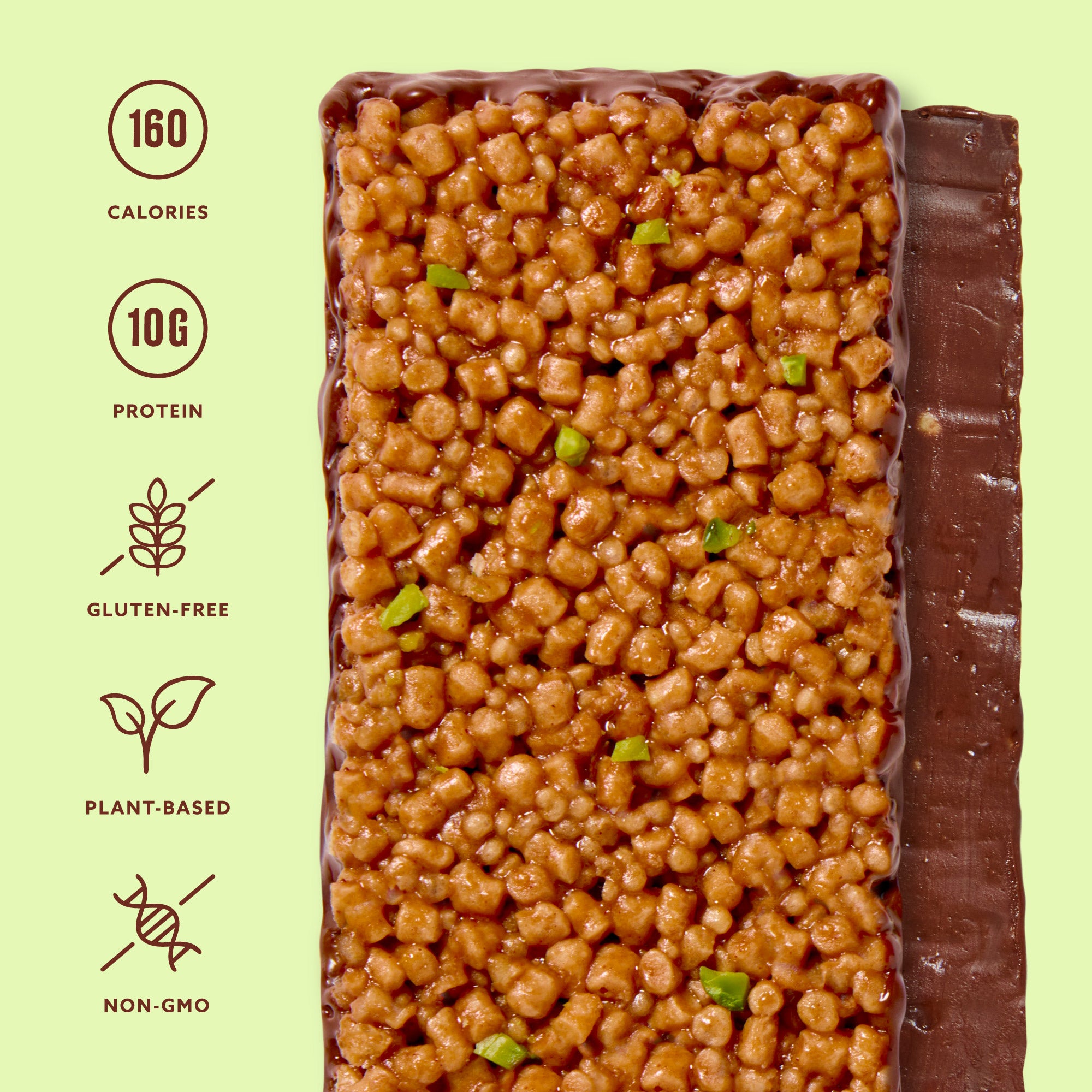 Plant-based protein bar with crispy rice cereal and green pistachio pieces, chocolate coating on side, nutritional info showing 160 calories and 10g protein