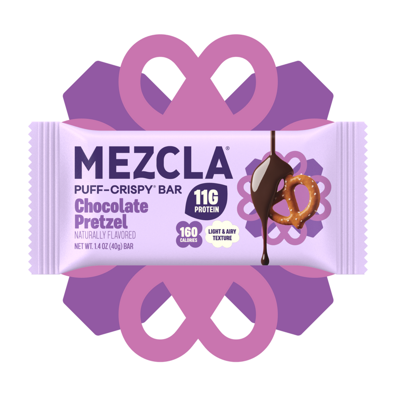 Mezcla Chocolate Pretzel puff-crispy protein bar package with 11g protein and 160 calories, featuring purple bow design and chocolate-drizzled pretzel illustration