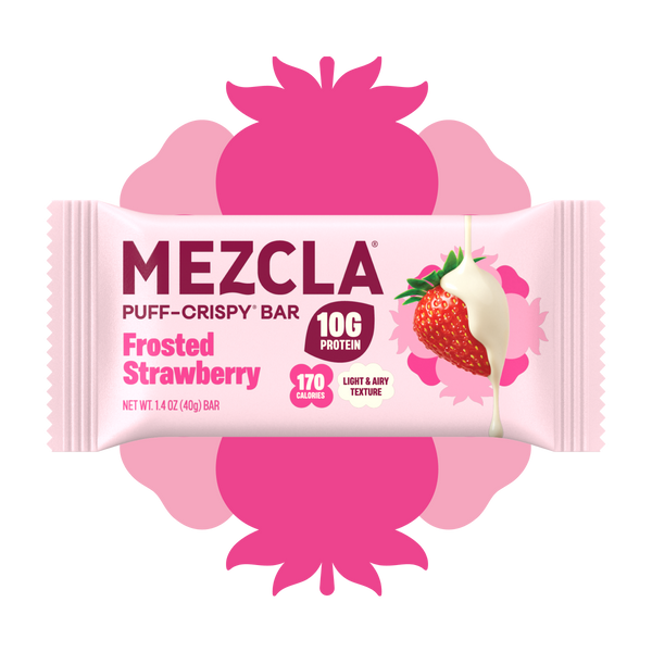 Mezcla Frosted Strawberry Puff-Crispy protein bar package with 10g protein and 170 calories, featuring pink strawberry design and white chocolate-dipped strawberry illustration