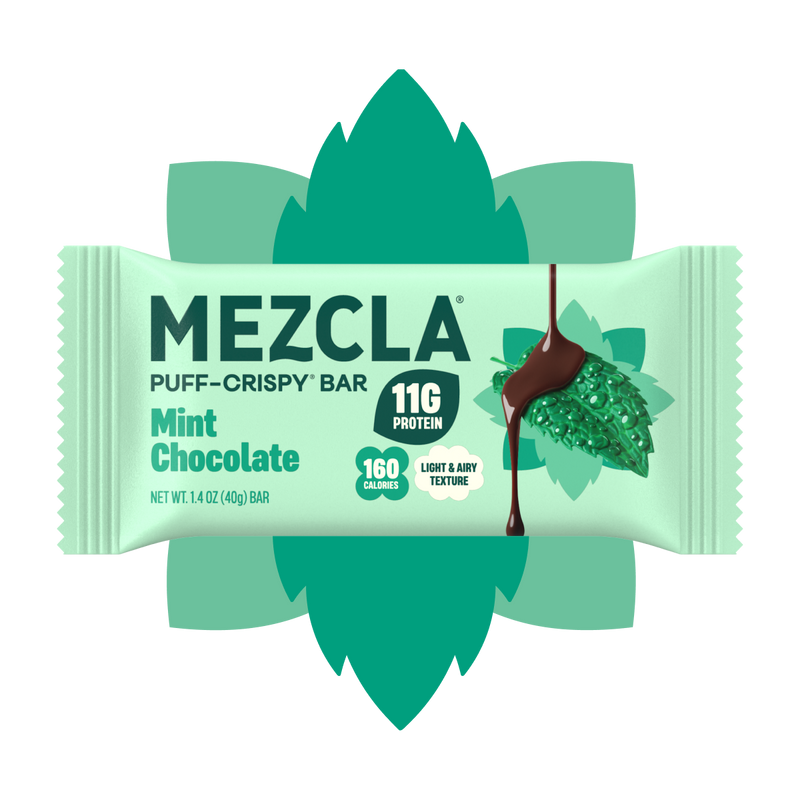 Mezcla Puff-Crispy Bar in Mint Chocolate flavor on light green wrapper with decorative green leaves, showing 11g protein and 160 calories
