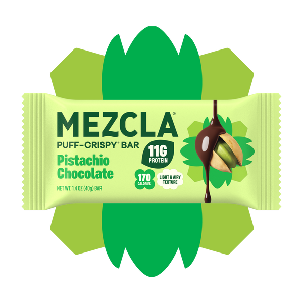 Mezcla Pistachio Chocolate puff-crispy protein bar package in green wrapper with decorative flower design, showing 11g protein and 170 calories