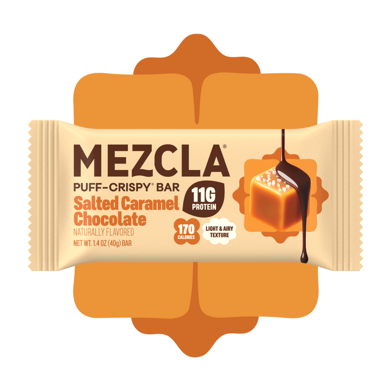 Mezcla Puff-Crispy Bar in Salted Caramel Chocolate flavor with 11g protein and 170 calories, featuring orange packaging and caramel cube graphic