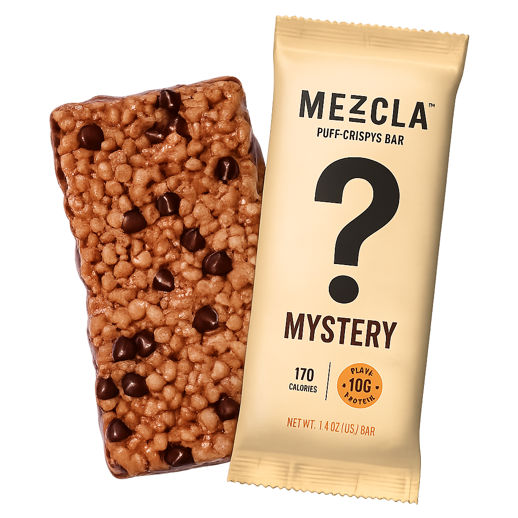 MEZCLA mystery flavor protein bar with puffed rice and chocolate chips next to tan packaging wrapper