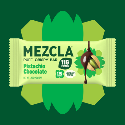 MEZCLA Pistachio Chocolate Puff-Crispy Bar package with 11g protein and 170 calories, featuring green leaf design and chocolate-drizzled pistachio illustration