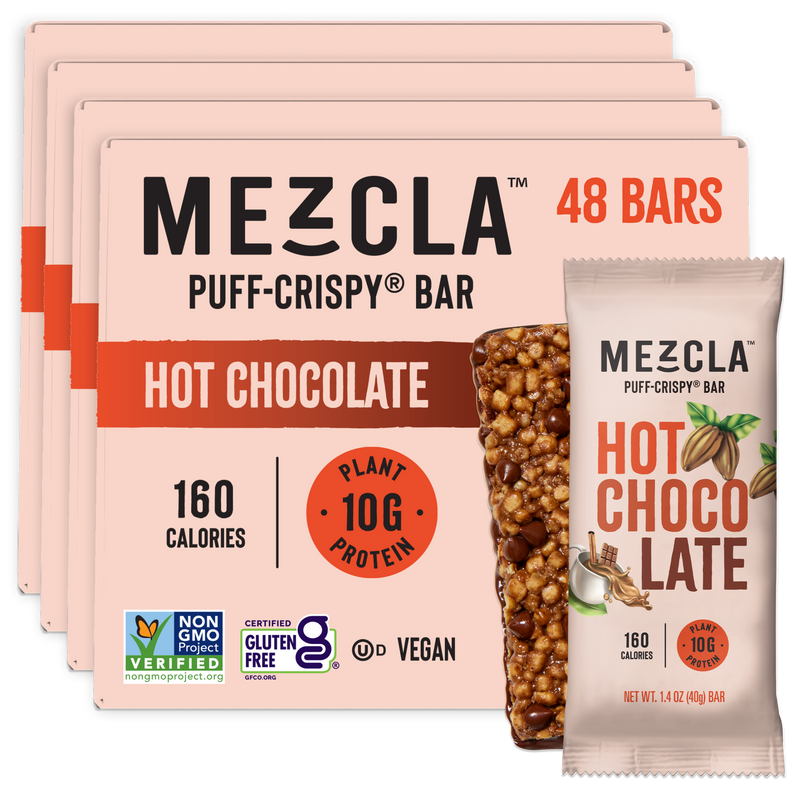 Four pink boxes of Mezcla Hot Chocolate Puff-Crispy protein bars with one individual bar shown, featuring 48 bars total and 10g plant protein