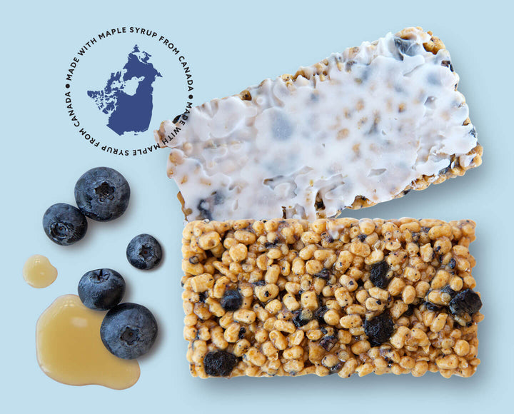 Arrangement of the bar with blueberries, syrup, and a stamp showing the maple syrup is from Canada