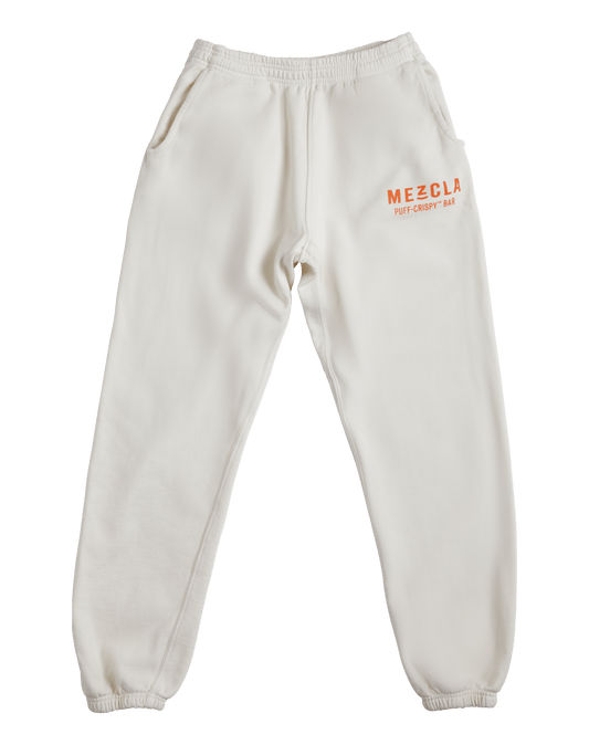 Mezcla sweatpants with Mezcla Puff-Crispy Bar shown towards the top of the left leg